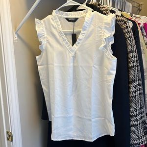 Never worn, doesn’t fit the way I needed it to for a specific outfit. From Belk